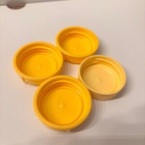 Medela Yellow Bottle Caps for Breast Milk Storage Containers Set of 4